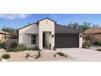 Beautiful single-story home featuring a modern design and a low-maintenance desert landscape at 3913 S 233Rd Ln, Buckeye, AZ 85326