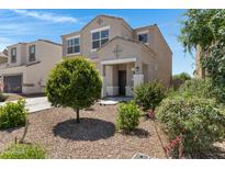 Charming two-story home featuring a covered front porch and low-maintenance desert landscaping at 4527 E Gagarinite Ln, San Tan Valley, AZ 85143