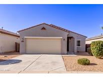 Charming one-story home featuring a two-car garage, low maintenance desert landscaping, and a neutral color palette at 45722 W Sky Ln, Maricopa, AZ 85139
