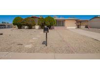 A charming single-Gathering home boasting a well-maintained front yard and mailbox, perfect for suburban living at 19251 N 17Th Dr, Phoenix, AZ 85027