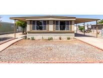 Charming mobile home with mature landscaping and covered parking at 2650 W Union Hills Dr # 98, Phoenix, AZ 85027