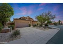 Charming single-story home with a desert-landscaped front yard, spacious driveway, and a two-car garage at 7307 E Black Rock Rd, Scottsdale, AZ 85255