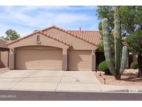 Charming single-story home with three-car garage and desert landscaping in a quiet neighborhood at 8008 W Ross Ave, Peoria, AZ 85382