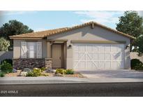 Charming single-story home featuring a two-car garage, stone accents, and a well-manicured front yard at 5561 S 246Th Ave, Buckeye, AZ 85326