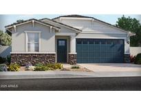 Charming single-story home featuring a two-car garage, stone accents, and low-maintenance landscaping at 5573 S 246Th Ave, Buckeye, AZ 85326