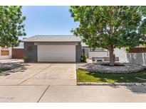 Charming single-Gathering home with a well-manicured front yard and a two-car garage at 9636 N 53Rd Ave, Glendale, AZ 85302