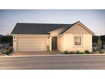 Single story home with stucco siding, brick driveway, two car garage and desert landscaping at 16448 W Whispering Wind Dr, Surprise, AZ 85387