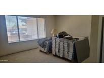 Bright bedroom showing flooring materials stacked on pallets, waiting for install at 7962 W Lincoln St, Peoria, AZ 85345