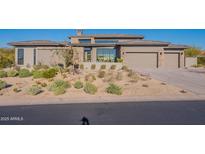 Stunning single-story home with desert landscaping, modern design, and inviting curb appeal at 8366 E Old Paint Trl # 3, Scottsdale, AZ 85266