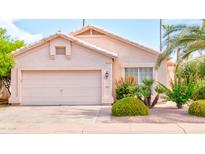 Charming one-story home with a well-manicured lawn and desert landscaping at 9248 E Blanche Dr, Scottsdale, AZ 85260