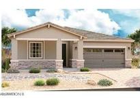 Charming single-story home featuring a stone facade, neutral palette, and two-car garage at 21348 N Belt Dr, Maricopa, AZ 85138