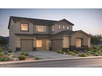 Beautiful two-story home featuring a stylish exterior and well-manicured landscaping at 24871 N 170Th Dr, Surprise, AZ 85387