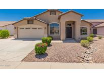 Charming single-story home with desert landscaping and a well-maintained front yard at 385 E Ironwood Dr, Chandler, AZ 85225