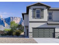 Inviting two-story home featuring a two-car garage and well-maintained landscaping with mountain views at 5840 E Covey Ln, Phoenix, AZ 85054