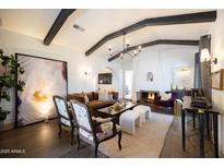 Spacious living room showcasing an open floor plan, with a fireplace, and stylish furnishings at 1309 W Lynwood St, Phoenix, AZ 85007