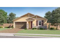 Charming single-story home featuring a well-manicured lawn, neutral colors, and a two-car garage at 1385 W Ridge Rd, Apache Junction, AZ 85120