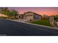 Charming single-Gathering home with a well-manicured front yard, desert landscaping and a spacious three-car garage at 1753 N Berrett --, Mesa, AZ 85207
