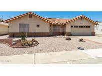 Charming single-story home with a terracotta roof, neutral stucco, and low-maintenance desert landscaping at 2005 Leisure World --, Mesa, AZ 85206