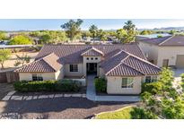 Charming single-story home with desert landscaping, and a tile roof, perfect for serene living at 3927 E Vista Grande --, San Tan Valley, AZ 85140