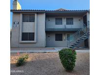 Apartment complex with well-maintained landscaping and visible unit numbers at 533 W Guadalupe Rd # 2126, Mesa, AZ 85210