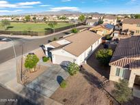 Charming single-story home with desert landscaping and views of a community park at 7305 W Darrel Rd, Laveen, AZ 85339