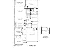 Detailed first floor plan showcasing the layout of this spacious layout with garage and bedrooms at 35941 W San Ildefanso Ave, Maricopa, AZ 85138