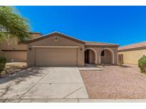 Charming single-story home featuring a low-maintenance desert landscape, covered entryway and a two car garage at 3719 W Carson Rd, Phoenix, AZ 85041