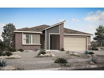 Modern home with brick and stucco, desert landscaping, and two-car garage at 25817 N 147Th Dr, Surprise, AZ 85387