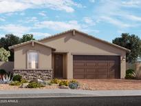 Inviting single-story home featuring a stone accent, a two-car garage, and desert landscaping at 4167 W Lisa Ln, San Tan Valley, AZ 85144