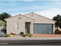 Charming single-story home showcasing a neutral color palette, desert landscaping, and a two-car garage at 4211 W Lisa Ln, San Tan Valley, AZ 85144