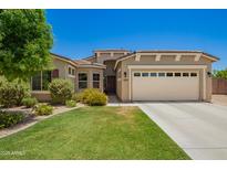 Charming single-Gathering home featuring a well-maintained lawn and two-car garage in a desirable neighborhood at 5735 S Cloverdale Ln, Gilbert, AZ 85298