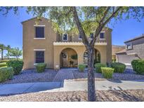 Charming two-story home featuring a welcoming front porch and well-maintained landscaping at 1786 S Seton Ave, Gilbert, AZ 85295