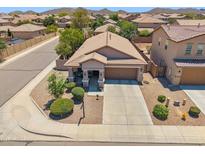 Well-maintained single-story home with desert landscaping and a two car garage in a quiet neighborhood at 4553 W Kirkland Ave, San Tan Valley, AZ 85144