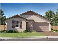 Charming single-story home featuring desert landscaping and a welcoming two-car garage at 1432 W Ridge Rd, Apache Junction, AZ 85120