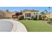 Charming home showcasing a well-manicured lawn and mature landscaping at 1535 W Winter Dr, Phoenix, AZ 85021