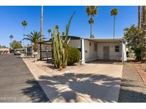 Charming single Gathering home in a park with desert landscaping and ample parking at 4065 E University Dr # 228, Mesa, AZ 85205