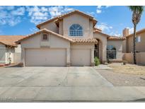 Beautiful two-story home with a three car garage and tile roof at 720 W Palo Verde St, Gilbert, AZ 85233