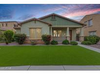 Charming single-Gathering home boasting mature landscaping, a cozy porch, and vibrant curb appeal at 3819 N Springfield St, Buckeye, AZ 85396