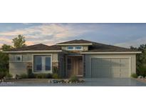 Beautiful single story home with a two car garage and desert landscaping at 17831 W Pasadena Ave, Litchfield Park, AZ 85340