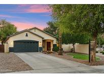 Charming single-story home with a well-maintained yard, two car garage, and inviting entryway at 1924 S Rome St, Gilbert, AZ 85295