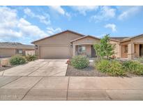 Charming single-story home with a well-maintained front yard and inviting entrance at 25787 W Allen St, Buckeye, AZ 85326