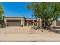 Charming home featuring desert landscaping, a brick walkway, and a quaint gated front entry at 3512 S Elm St, Tempe, AZ 85282