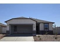 Charming single-story home with a two-car garage and neutral color scheme at 35523 N Breezy Ln, San Tan Valley, AZ 85140