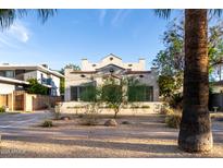 Charming home with unique architectural details and desert landscaping at 725 W Portland St, Phoenix, AZ 85007