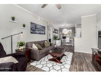 Comfortable living room with modern decor, featuring a plush sofa and inviting textures at 29606 N Tatum Blvd # 245, Cave Creek, AZ 85331