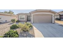 Charming single-story home with desert landscaping and a two-car garage at 3649 E Hazeltine Way, Chandler, AZ 85249