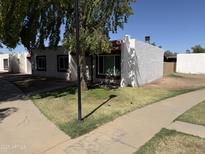 Charming single-story home featuring a well-maintained front yard and a stucco exterior, offering comfortable living at 4652 W Desert Crest Dr, Glendale, AZ 85301