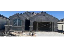 Exterior image of a home under construction, showing the stucco and tile roof at 25478 W Graham Trl, Buckeye, AZ 85326