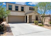 Charming two-story home with a spacious driveway and a neutral color palette at 12531 W Glenn Dr, Glendale, AZ 85307