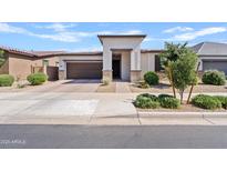 Charming single-story home featuring a manicured front yard and a welcoming entrance in a suburban neighborhood at 22938 E Calle Luna --, Queen Creek, AZ 85142